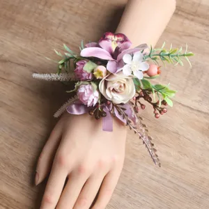 Pink purple artificial wrist flower corsage for wedding bridal party floral decoration detail.