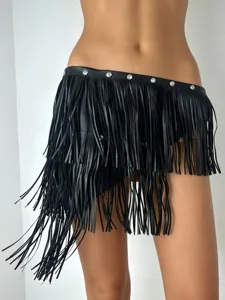 Detail shot of black faux leather fringe belt with metal rivets punk style waist accessory