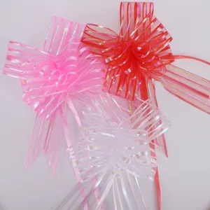 Gift pull bow detail view showing colorful ribbon decorations, perfect for wrapping and party decor.