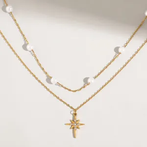 Double layer stainless steel necklace with pearls and sparkling star pendant for women.