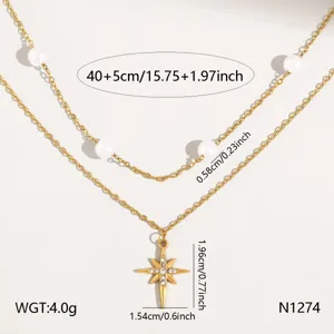 Detail shot of double layer gold stainless steel necklace with pearl and rhinestone star pendant.