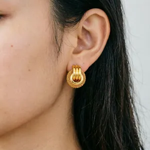 Detailed view of retro 18k gold plated stainless steel multi ring earrings, elegant jewelry.