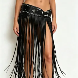 Punk style black leather wide belt with metal studs and long fringe tassel skirt accessory.