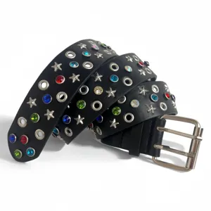 Trendy black rhinestone star and eyelet studded leather belt main view showing stylish design.