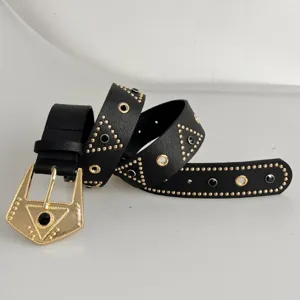 Punk rhinestone rivet leather belt with gold geometric buckle for women fashion waist accessory.