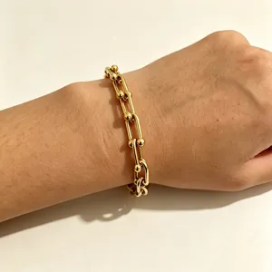 Elegant gold plated link bracelet with modern chain design for stylish women daily wear.