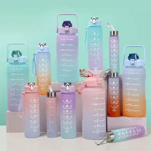 Large capacity gradient plastic water bottle with time marker and motivational quote for sports.