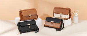 Modische lange Damen Geldbörse aus PU Leder mit Kartenfächern und Blatt Anhänger.