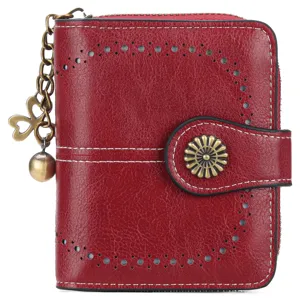 Red women's short leather wallet with zipper closure, snap button, and hollow-out design.