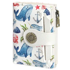Close-up of the wallet featuring a watercolor ocean animal pattern and a metal flower snap.