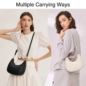 Detail shot showing multiple carrying ways of the stylish crescent shoulder bag with strap.