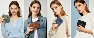 Detailed view of women's short wallet with retro embossed floral design and snap button closure.