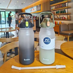 Large capacity frosted plastic gradient sports water bottle with straw and handle for outdoor.