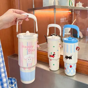 Cute portable cartoon thermos cup with straw and handle, large capacity for office and travel use.