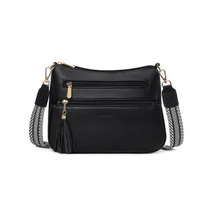 Women black PU leather crossbody shoulder bag with multi-zipper pockets and wide strap.