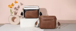 Detailed view of the stylish women crossbody shoulder bag with multi-zipper and wide strap.