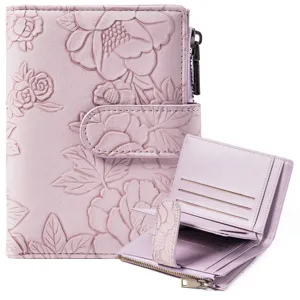 Close-up detail of the embossed floral PU leather short wallet showing card slots and zipper.