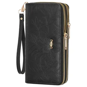 Black long double zipper wallet detail, elegant embossed floral pattern with wristlet strap.