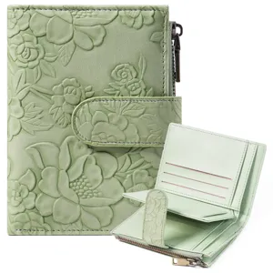 Embossed floral PU leather trifold short wallet with zipper and snap button for women.