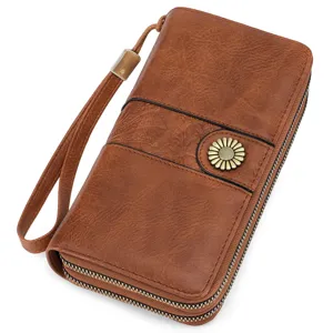 Detailed view of women vintage brown PU leather double zipper long wallet clutch with wrist strap.