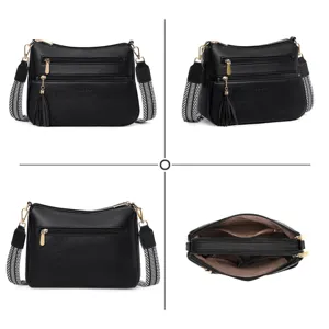 Detailed view of black PU leather women crossbody shoulder bag with multi zip pockets and strap.
