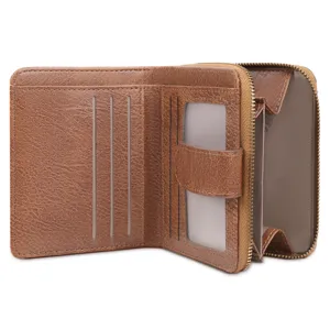 Detailed view of women short brown wallet with multiple card slots and zip pocket.