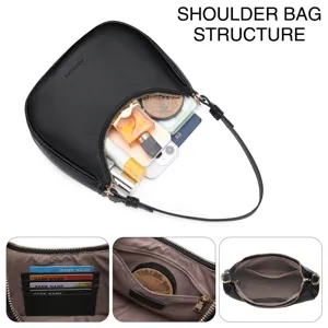 Detailed view of the black PU leather crescent shoulder bag showing interior storage structure.