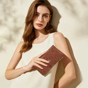 Elegant women's long vintage embossed floral wallet clutch purse with snap button and card slots.