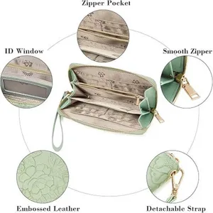 Women's floral embossed long wallet with zipper pocket, ID window and wrist strap.