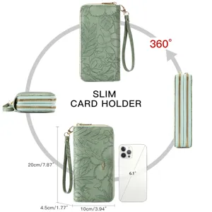 Green embossed long wallet with double zippers, wrist strap and multi-angle size details.