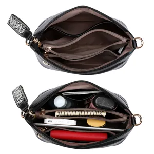 Detailed view of the large capacity black bucket bag interior compartments and storage space.