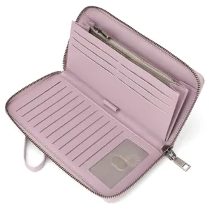 Pink women long zip wallet interior detail with multi card slots and zipper pocket space.