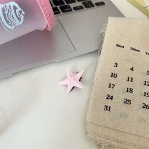 Sweet pink starfish hair clip for women, cute side bangs hairpin, fresh daily hair accessory.