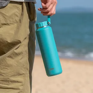 TYESO large capacity insulated water bottle detail view, teal portable sports cup for outdoor use.