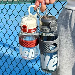Large capacity portable sports water bottle with dual-drink straw design for outdoor activities.