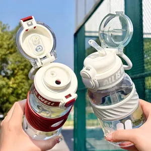 Large capacity sports water bottle with straw and dual-drink lid, portable outdoor cup.