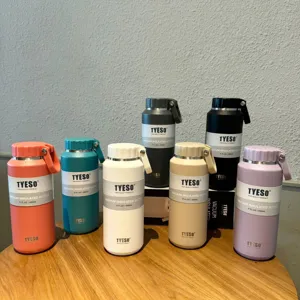 Detailed view of colorful Tyeso 500ml vacuum insulated stainless steel water bottles.