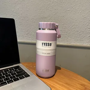 Purple stainless steel vacuum insulated water bottle 500ml with portable lid design.
