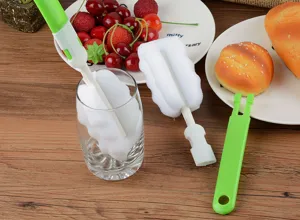 Long handle sponge cup brush detail, green handle with white wave sponge for daily bottle cleaning.