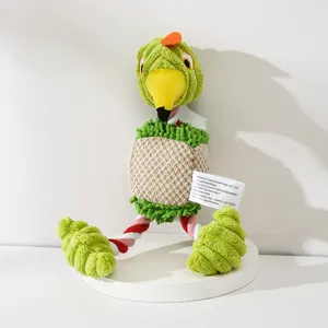 Plush flamingo dog toy with squeaker and rope, cute green pet chew toy for interactive play.