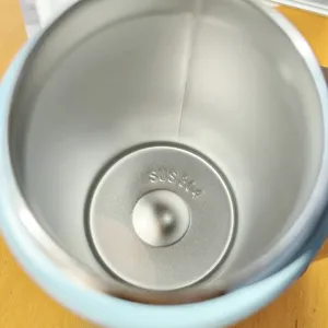 Stainless steel tumbler interior detail, showcasing durable 304 food-grade material construction.