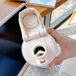 Detailed closeup of white insulated sports water bottle lid and leakproof drinking spout.