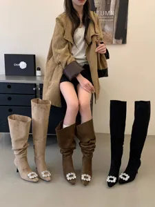 Chic over-the-knee suede boots with pointed toes and sparkly rhinestone square buckles.