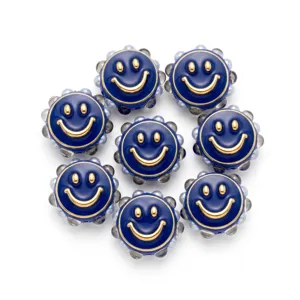 Detailansicht dunkelblauer Harz-Smiley-Perlen mit goldenem Gesicht, ideal für DIY-Bastelarbeiten.