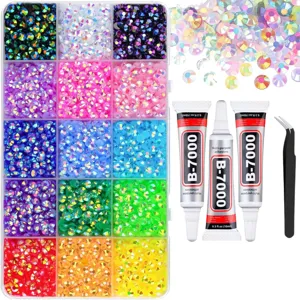 Colorful flatback resin rhinestone nail art kit with organizer box, glue and tweezers.