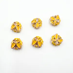 Cuentas de mariposa de resina con marco de oro rosa y pedrería para joyería DIY.