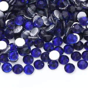 Blue glass flatback rhinestones for nail art and craft DIY. Sparkling crystal gems detail.