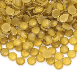 Yellow flatback crystal rhinestones detail shot, ideal for nail art DIY and crafts.