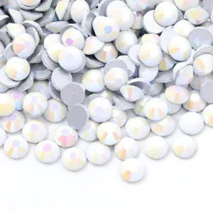 Close-up detail of shimmering multi-color flatback glass rhinestones for DIY crafts and nail art.