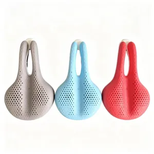 Detailed view of silicone bicycle saddle cushion with breathable honeycomb holes and comfortable fit.